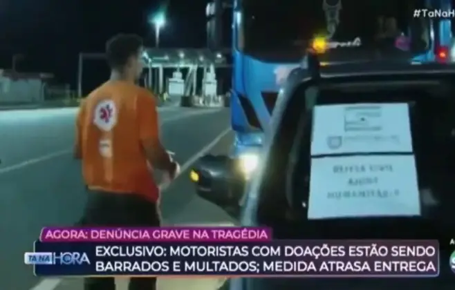 Vídeo: Âncora do SBT flagra caminhões com doações ao RS sendo multados. 
